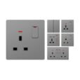 Grey British electrical plug socket and switch