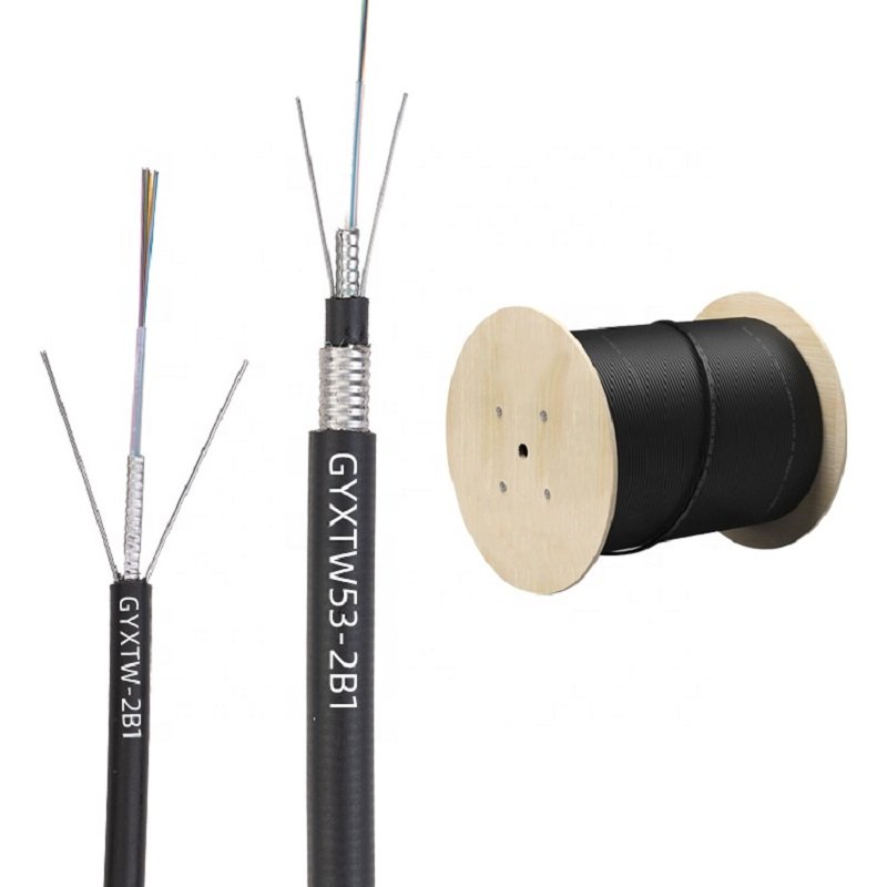 GYXTW Fiber Optic Cable with exposed internal structure and a cable spool