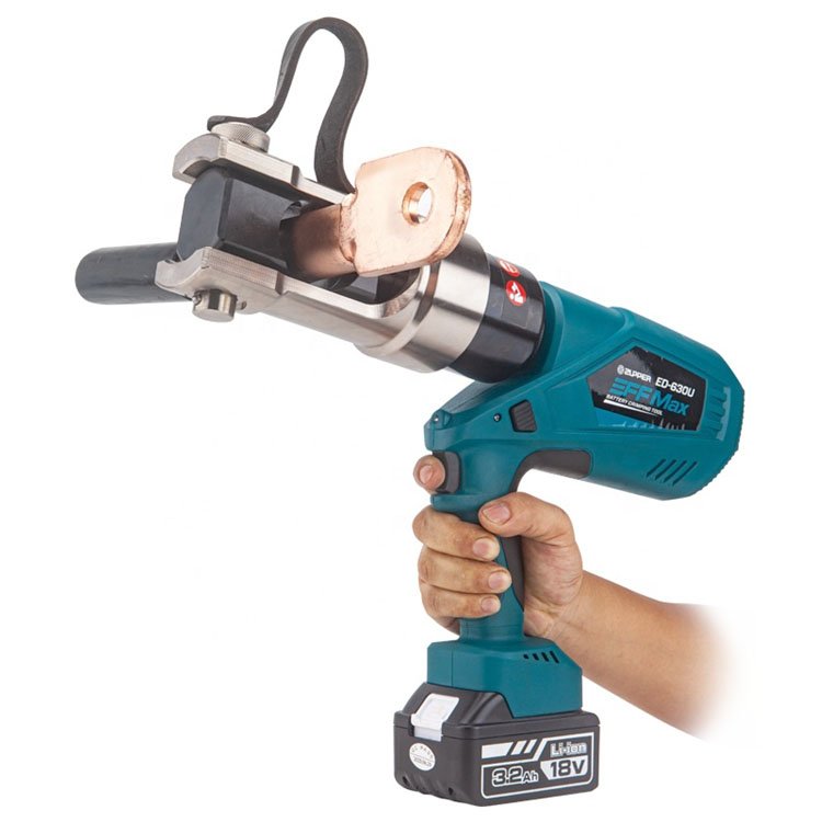 A professional holds a cordless Electric Hydraulic Crimping Tool with a copper cable lug posit