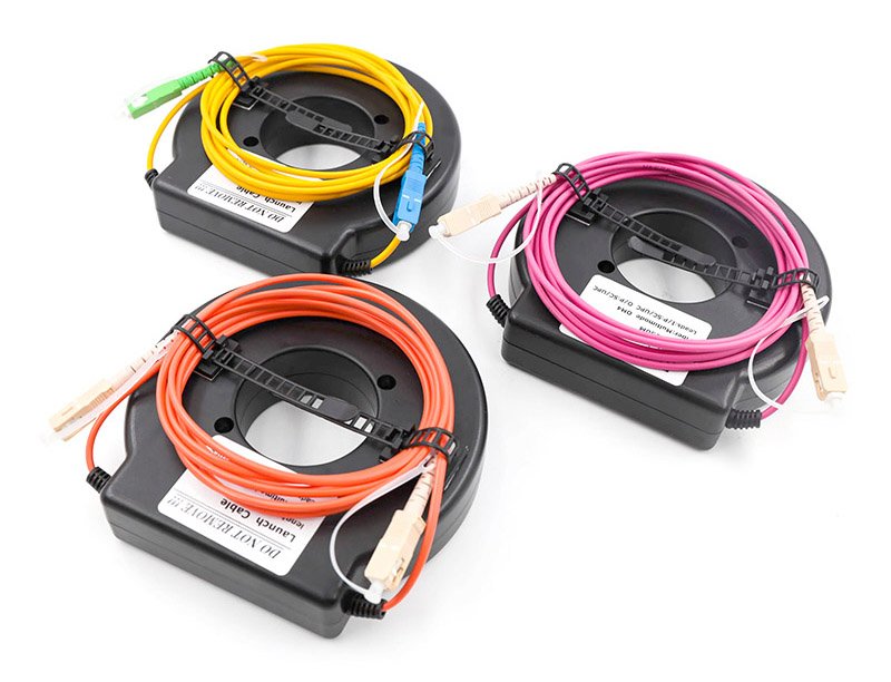 Three different colored OTDR Launch Cable Ring units