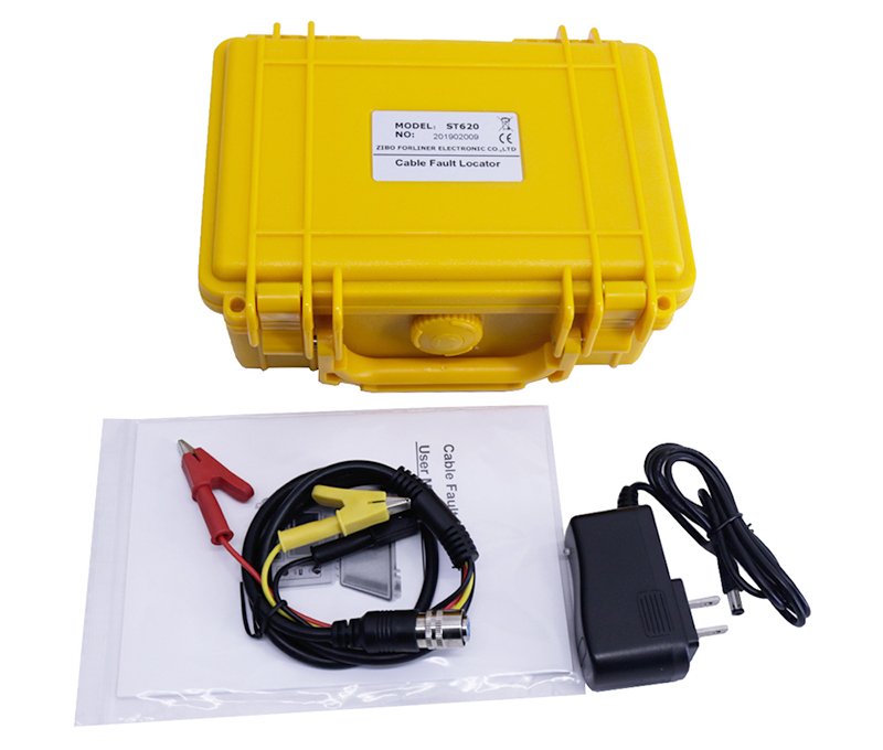 Yellow TDR Cable Fault Locator kit in a hard case, shown with a power adapter, user manual, and a set of cables with alligator clip