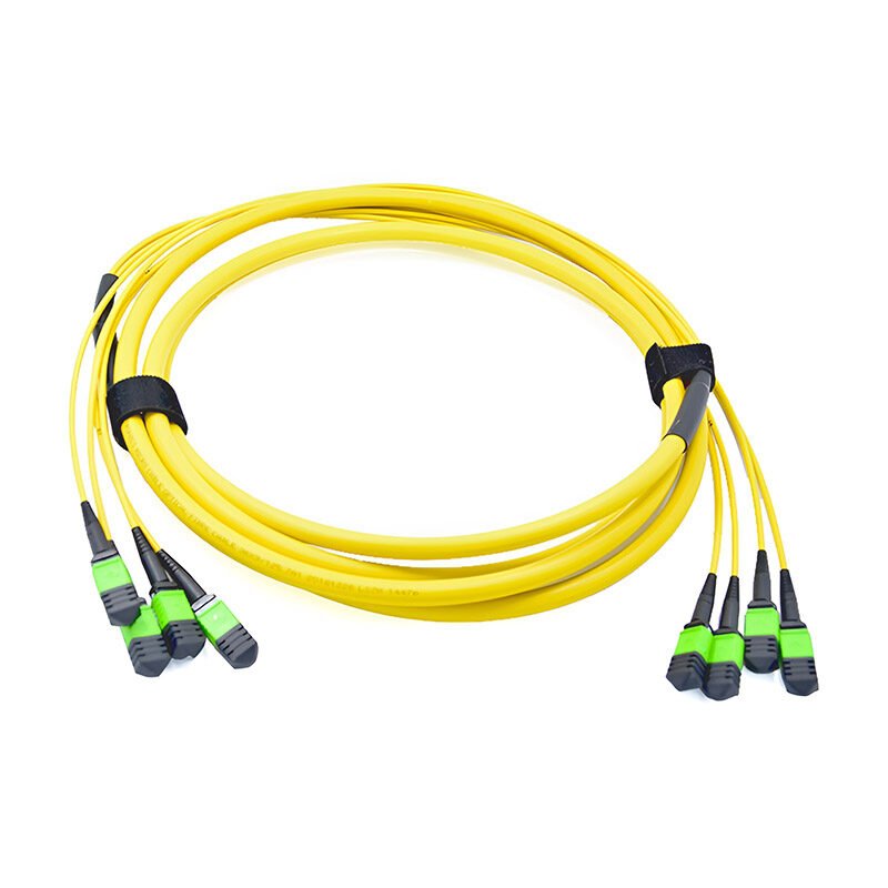A coiled yellow MPO/MTP quadplex fanout cable with female MPO connector