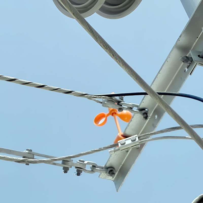 Optical Cable Grounding Wire securing cables to a metal support structure