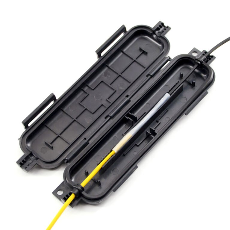 A black, open Fiber Optic Protection Box showing an internal yellow fiber optic cable with a splice protector