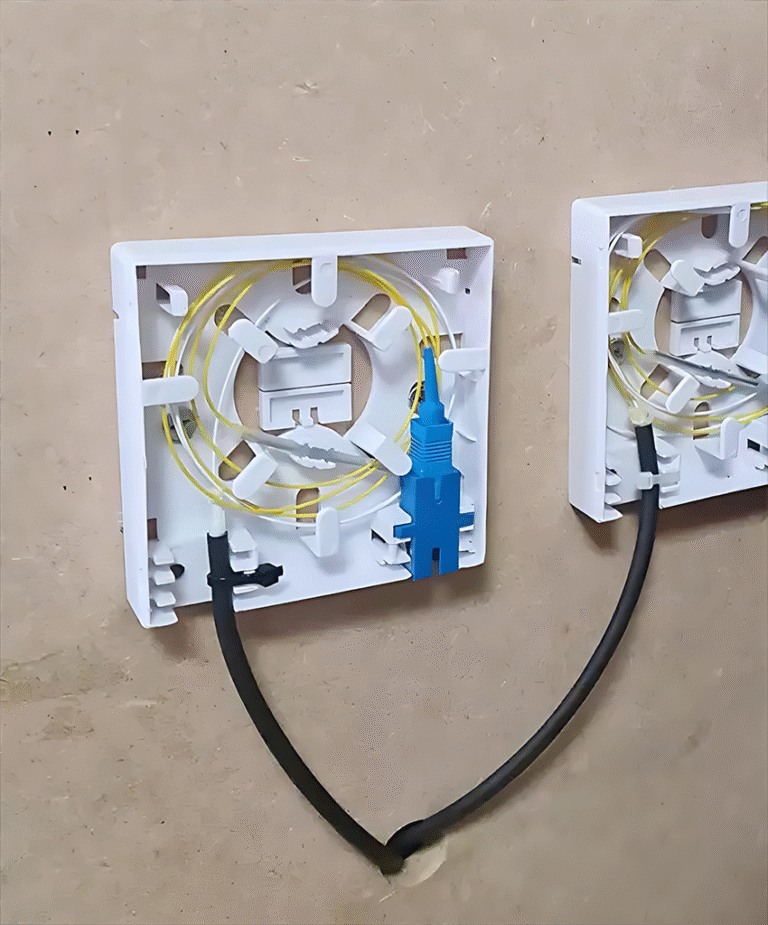A wall-mounted Fiber Optic Faceplate with an open cover