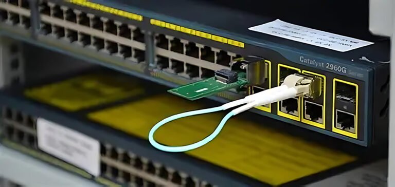 A fiber optic loopback cable plugged into a network switch